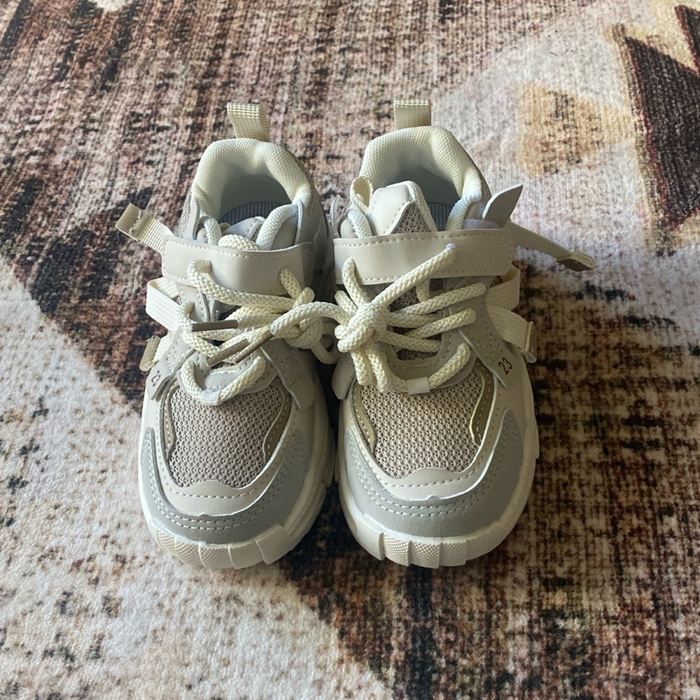 Brand new Toddler size 11US neutral colored sneakers.